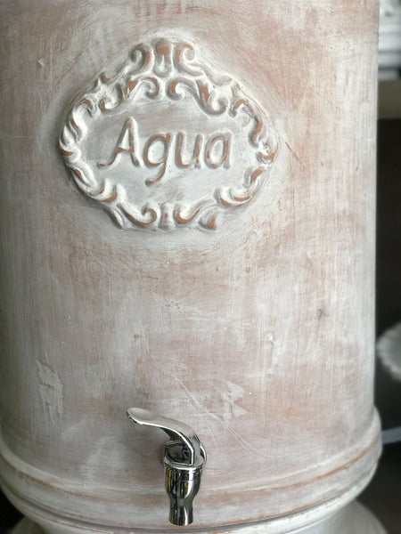 Cu. Despachador de agua